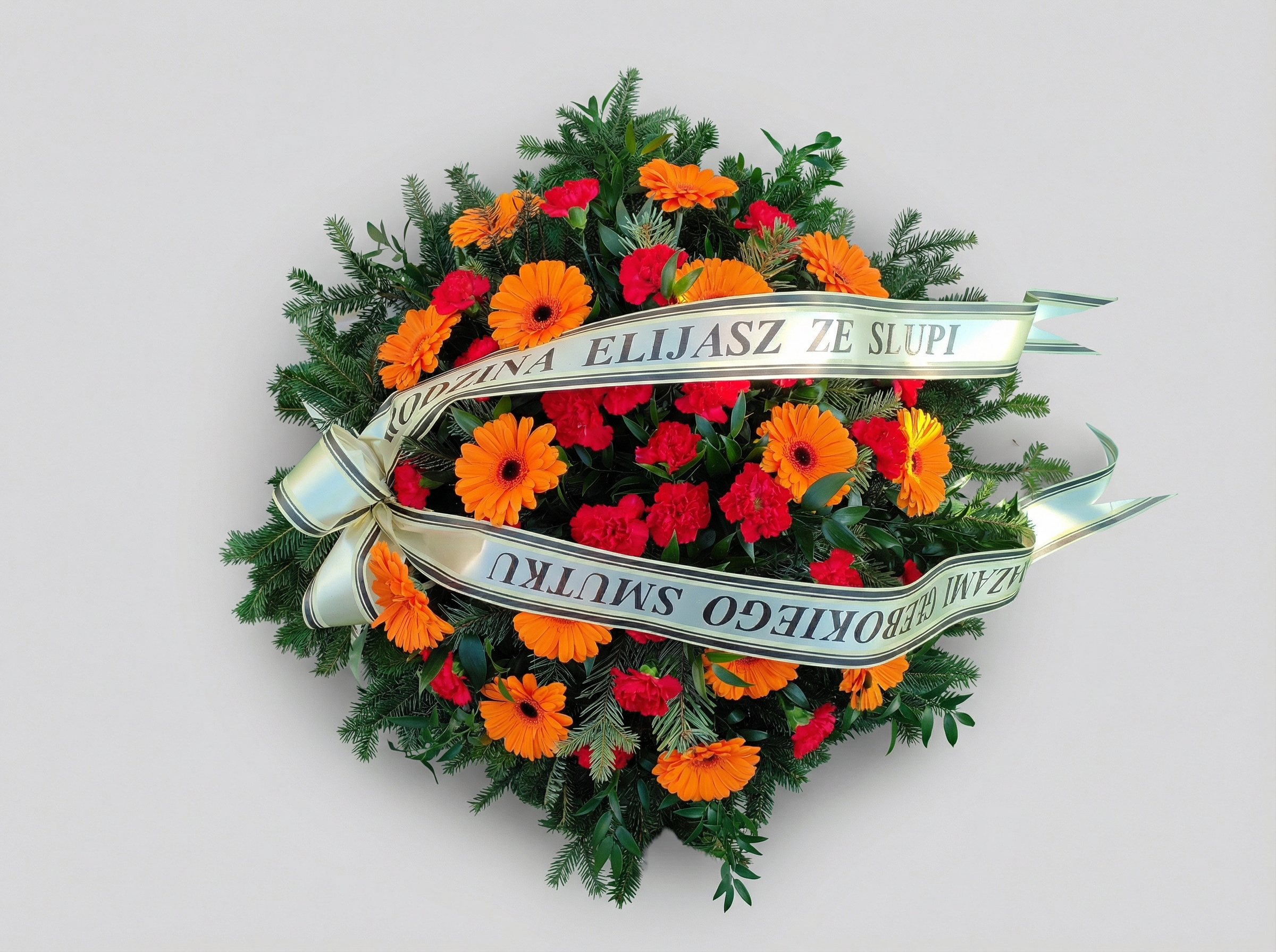 Wieniec Gerbery i Goździki – Pomarańcz z Czerwienią - Wieniec pogrzebowy - Kwiaciarnia Pogrzebowa